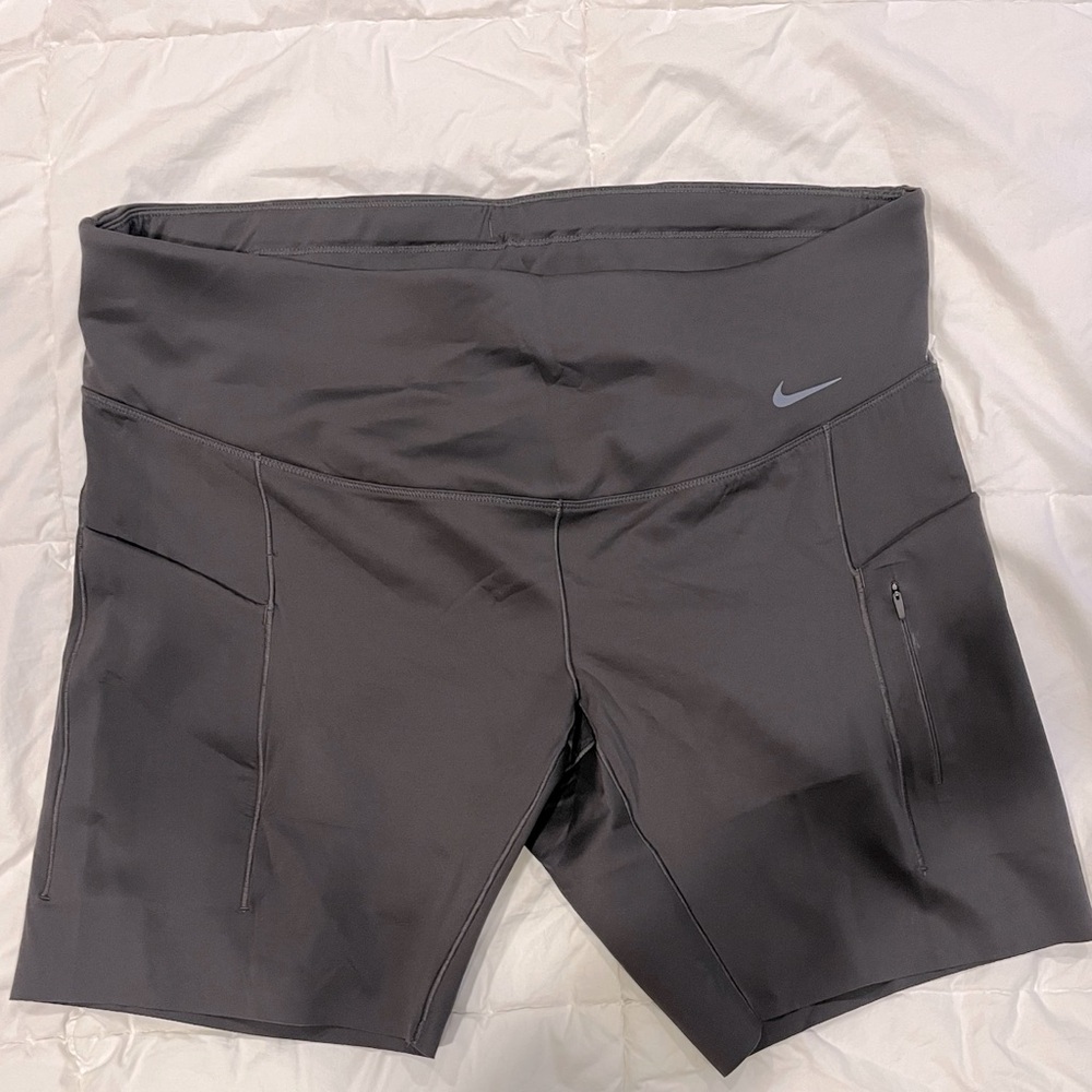 NWT Nike dark gray dry-fit XL women’s biker shorts. Measurements in pics.